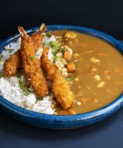 Kerrie rijst met tempura garnalen